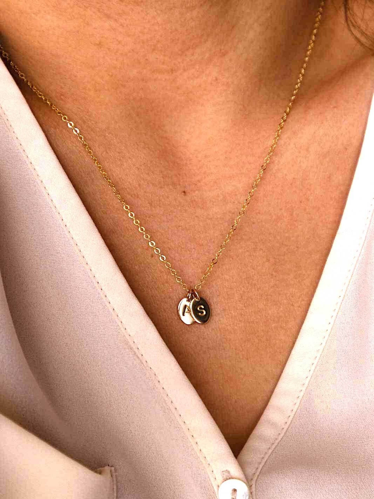 Oval letter pendants personalised