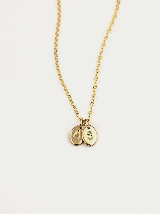 Oval letter pendants personalised