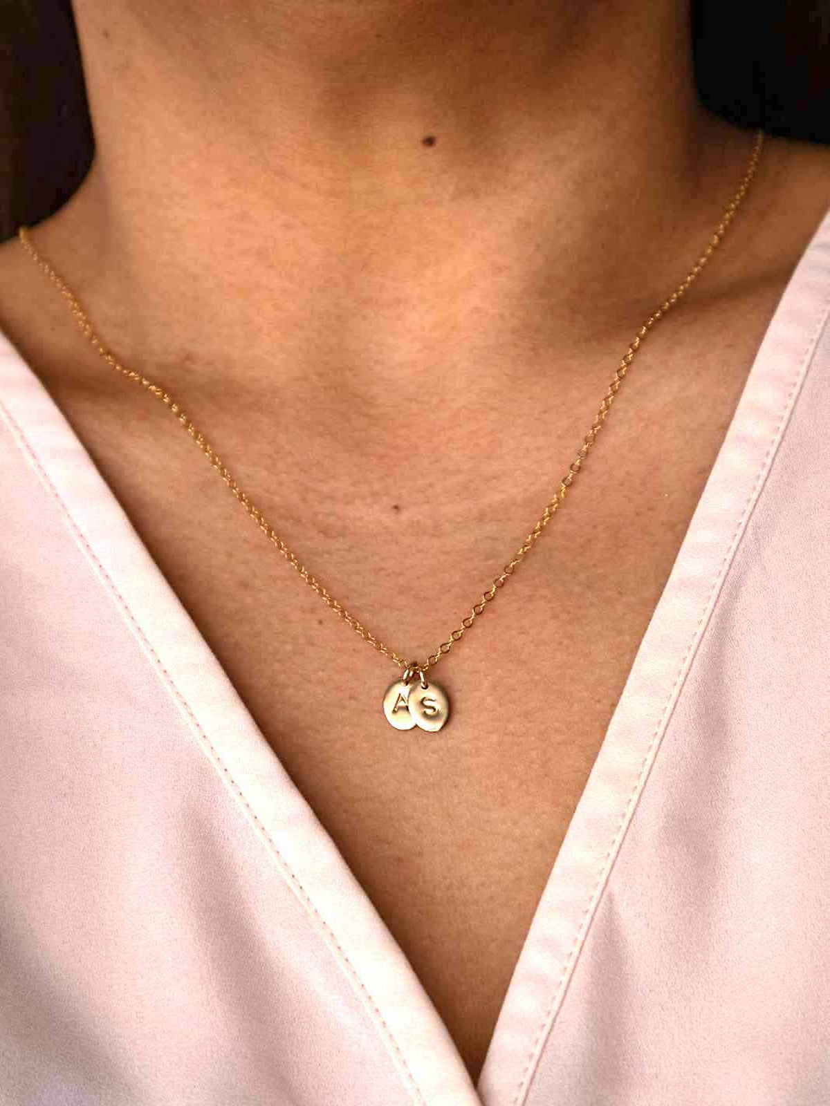 Oval letter pendants personalised