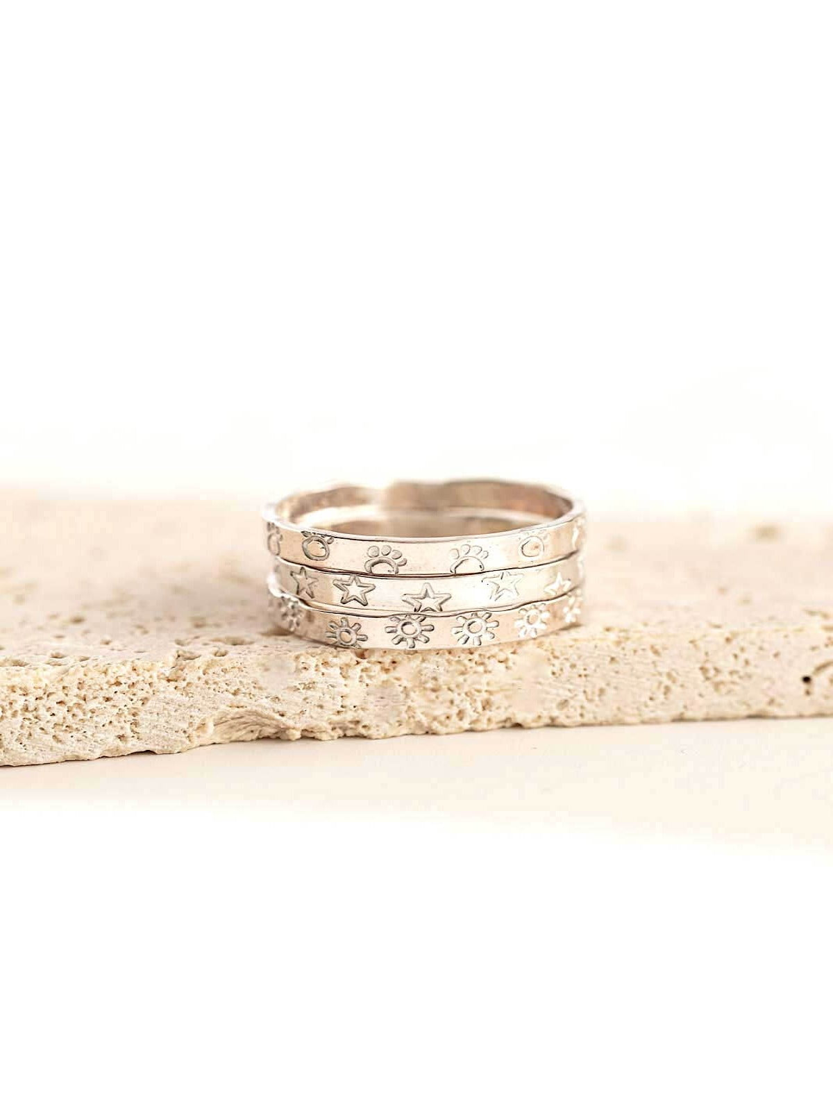 Infinity ring band with symbols sterling silver
