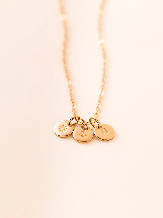 Symbols pendants in gold