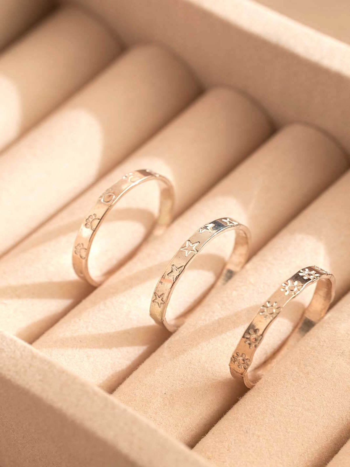 Infinity ring band with symbols sterling silver