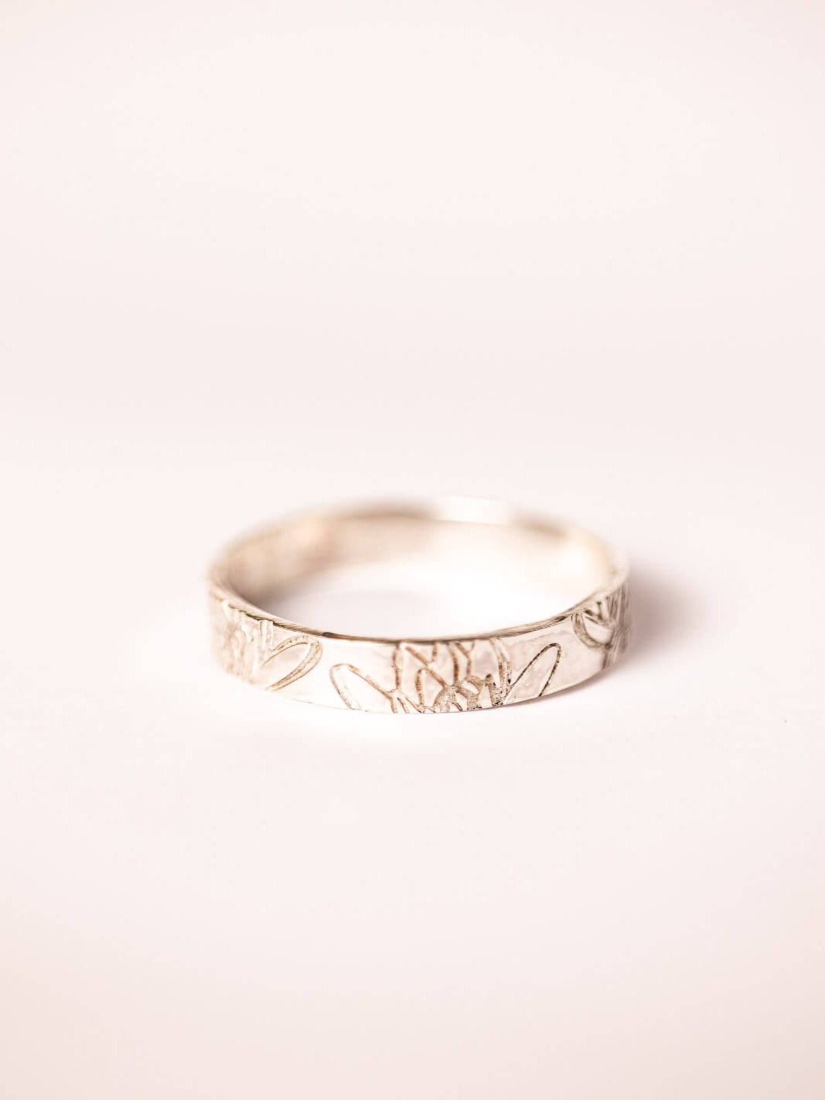sterling silver band rings with symbols sterling silver band rings with symbols on finger sterling silver band rings with symbols worn sterling silver symbols band rings sterling silver symbols rings on held Sterling Silver thin symbols band ring waterlily ring