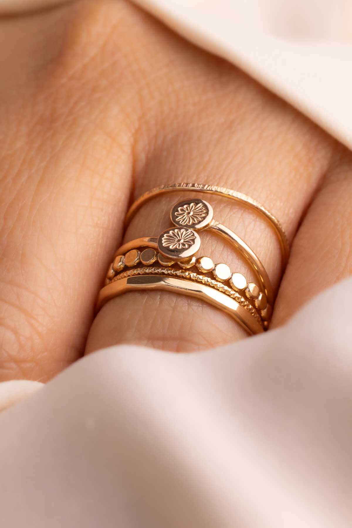 Gold rings layered stacked